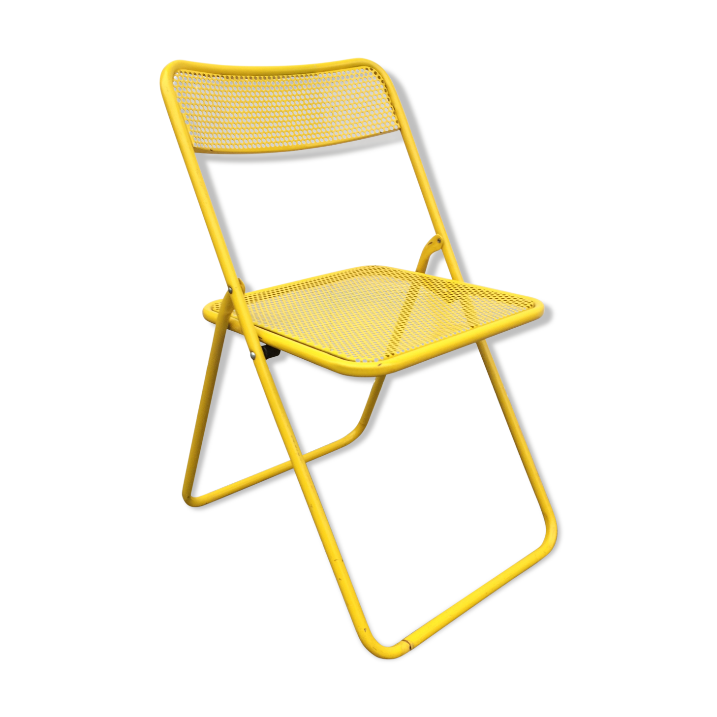 Perforated folding metal chair