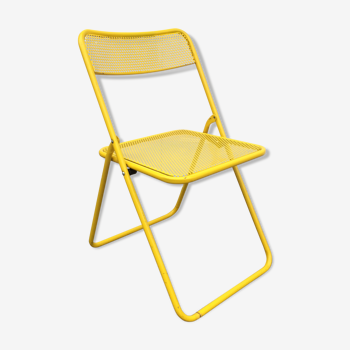 Perforated folding metal chair