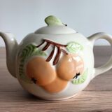 Slush teapot with embossed fruit decoration