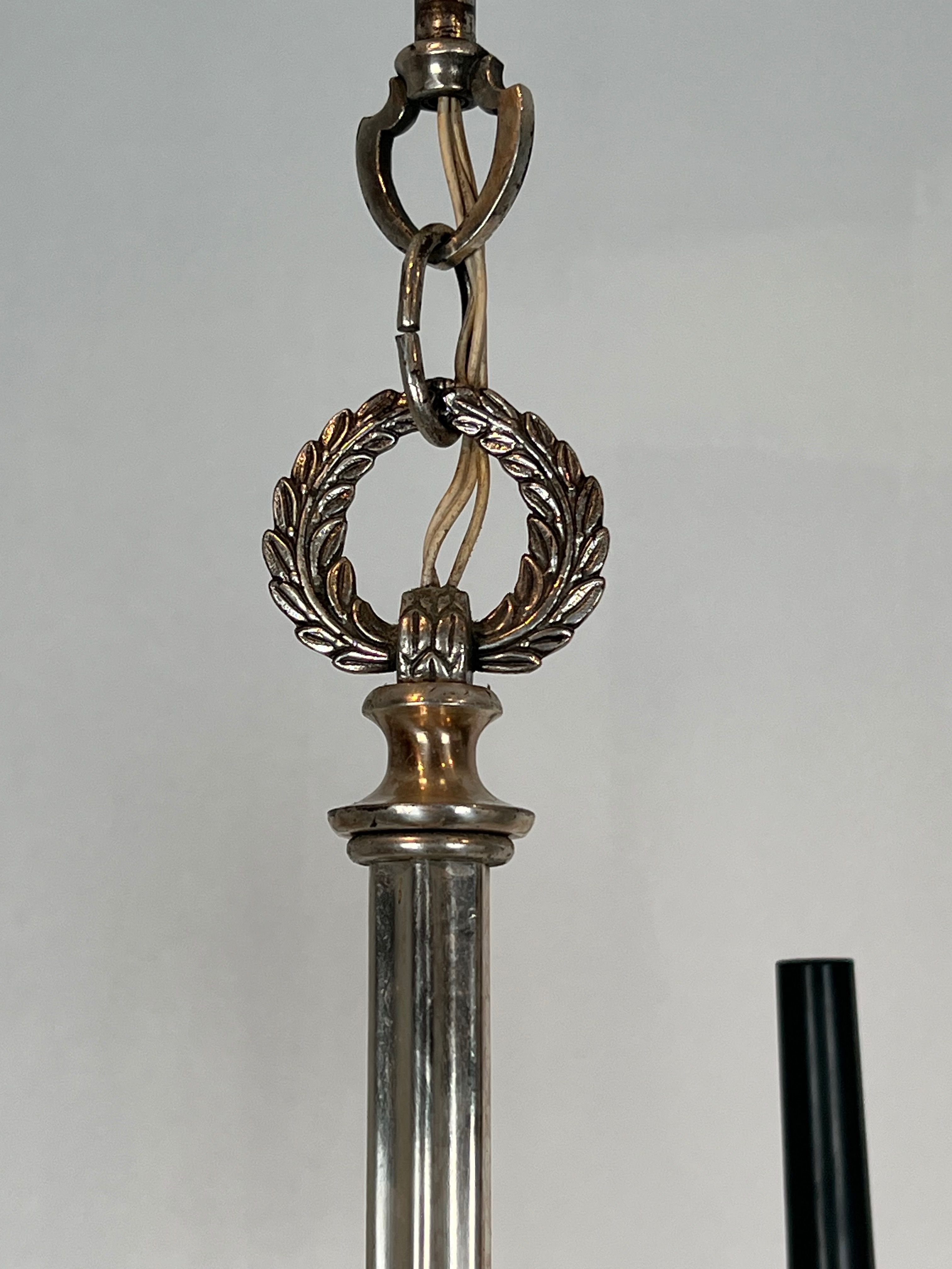 Neoclassical style chandelier in silver-plated metal by the house of Charles.