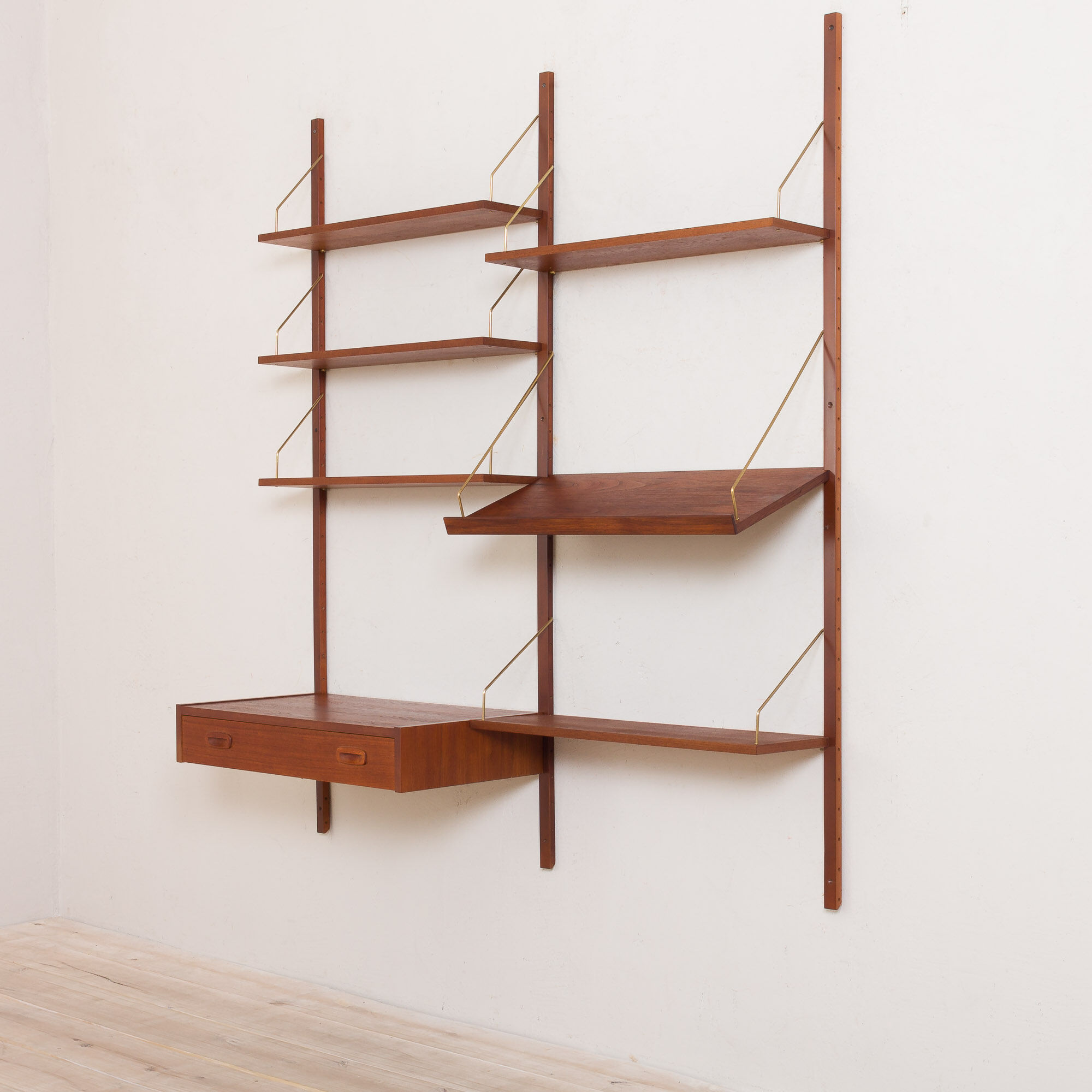 Danish teak wall unit with a desk and magazine tilted shelf