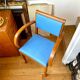 Bridge armchair in wood and blue skaï