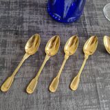 Set of 8 golden dessert spoons by Christofle, model "with fillet"