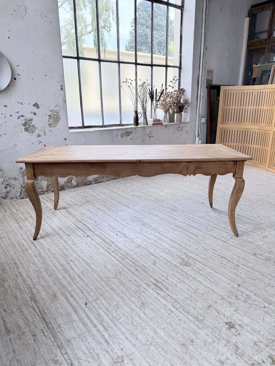 Farm table cherry wood with curved legs, 19th century.