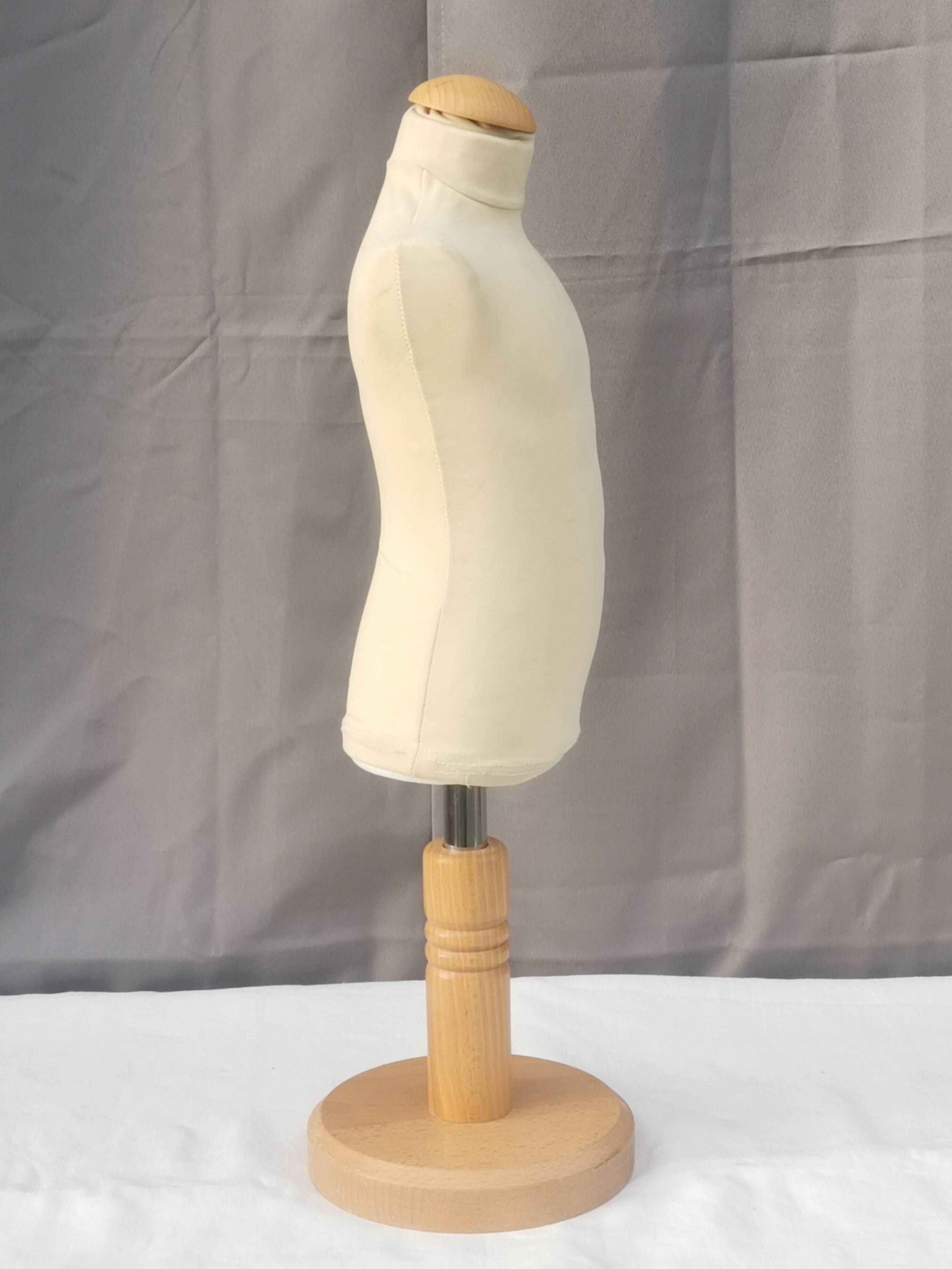 "Child bust" mannequin on base