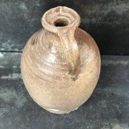 Old varnished sandstone jug