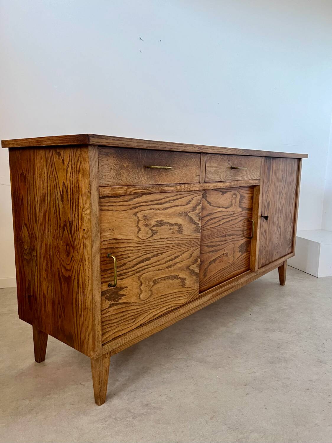 Old oak sideboard from the 1950s, vintage reconstruction period