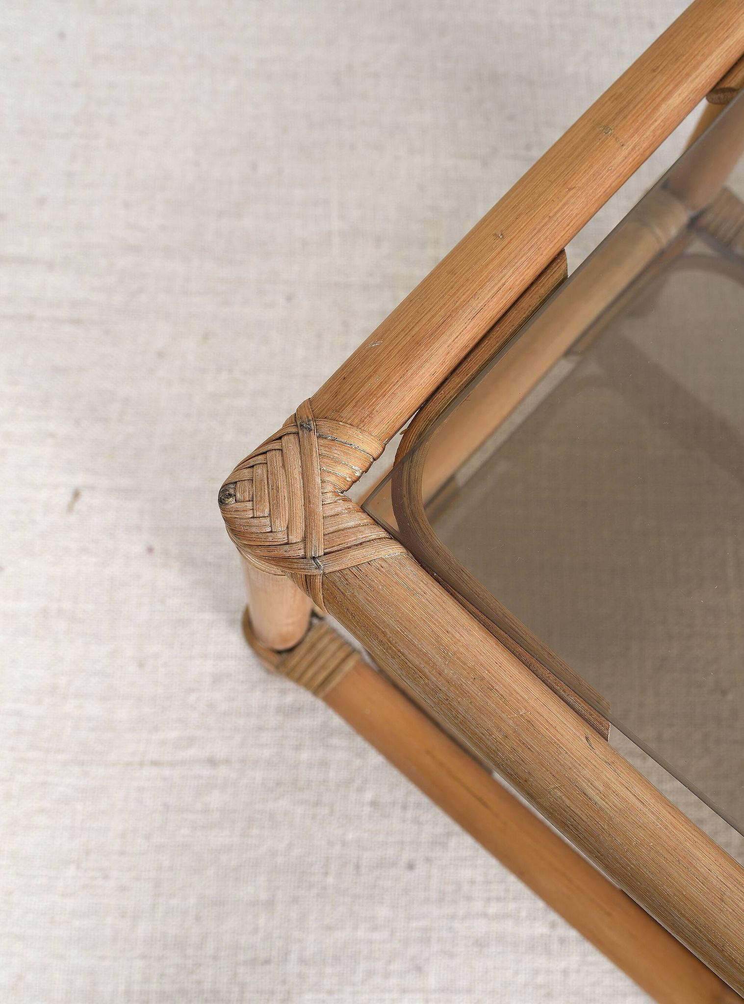 Pair of bedside tables or side tables, in rattan and smoked glass