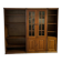 Set of 3 wall display cabinets from the 1970s in brown wood — central display modules and side shelves.
