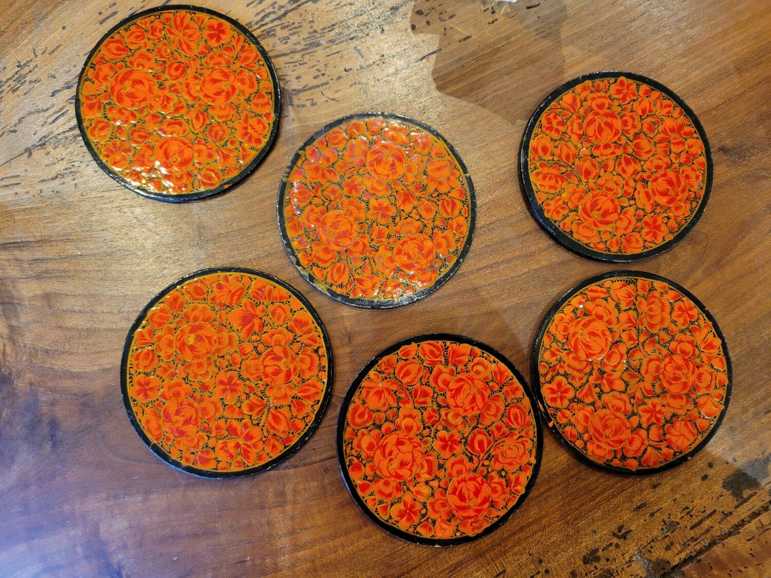 Under a painted wooden frame