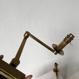 Pair of brass wall lights with articulated arms from the 70s