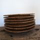 Set of 7 presentation plates in wicker rattan cannage