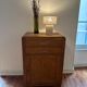 Small honey-coloured wooden buffet