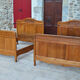 Pair of beds and Art Nouveau bedside in oak, France, circa 1910