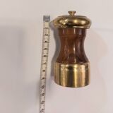 Varnished wood and brushed brass pepper mill