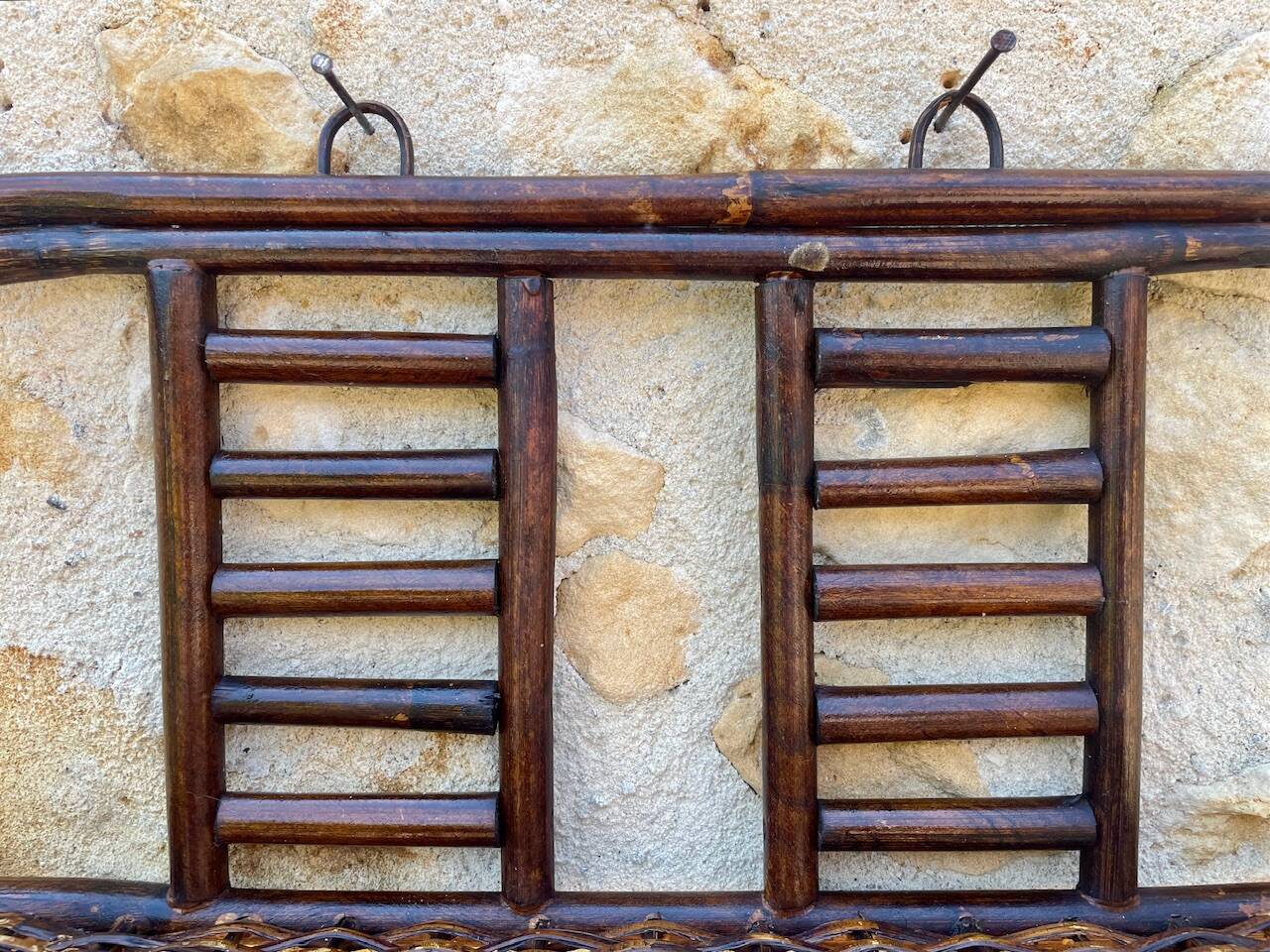 Vintage wall shelf in bamboo and rattan, circa 1960s.