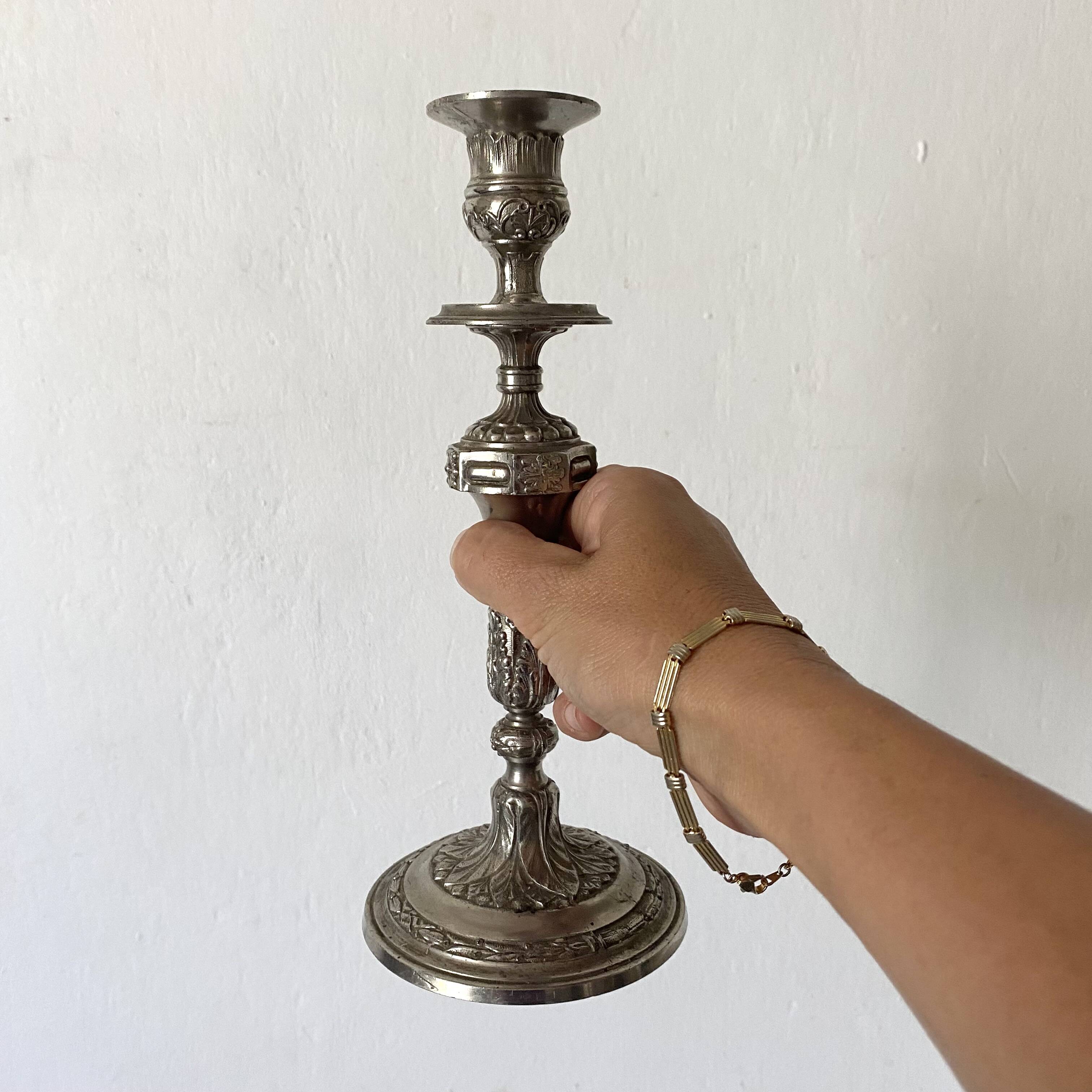 Pair of old silver-plated candlesticks