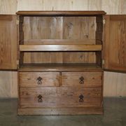 Antique Victorian pine governess buffet with sliding shelf.