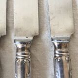 Silver round knives with stainless steel blades
