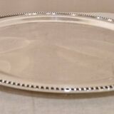 Round serving platter in silver-plated metal