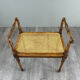 Banquette / tabouret en bois sculpté et cannage, XXe siècle