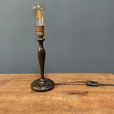 Black table lamp with paint splatters from the 1920s