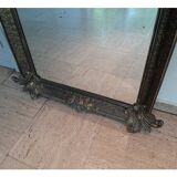 Baroque “trumeaux” mirror in carved solid wood.