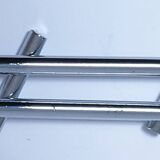 Twelve 70s design metal knife holders
