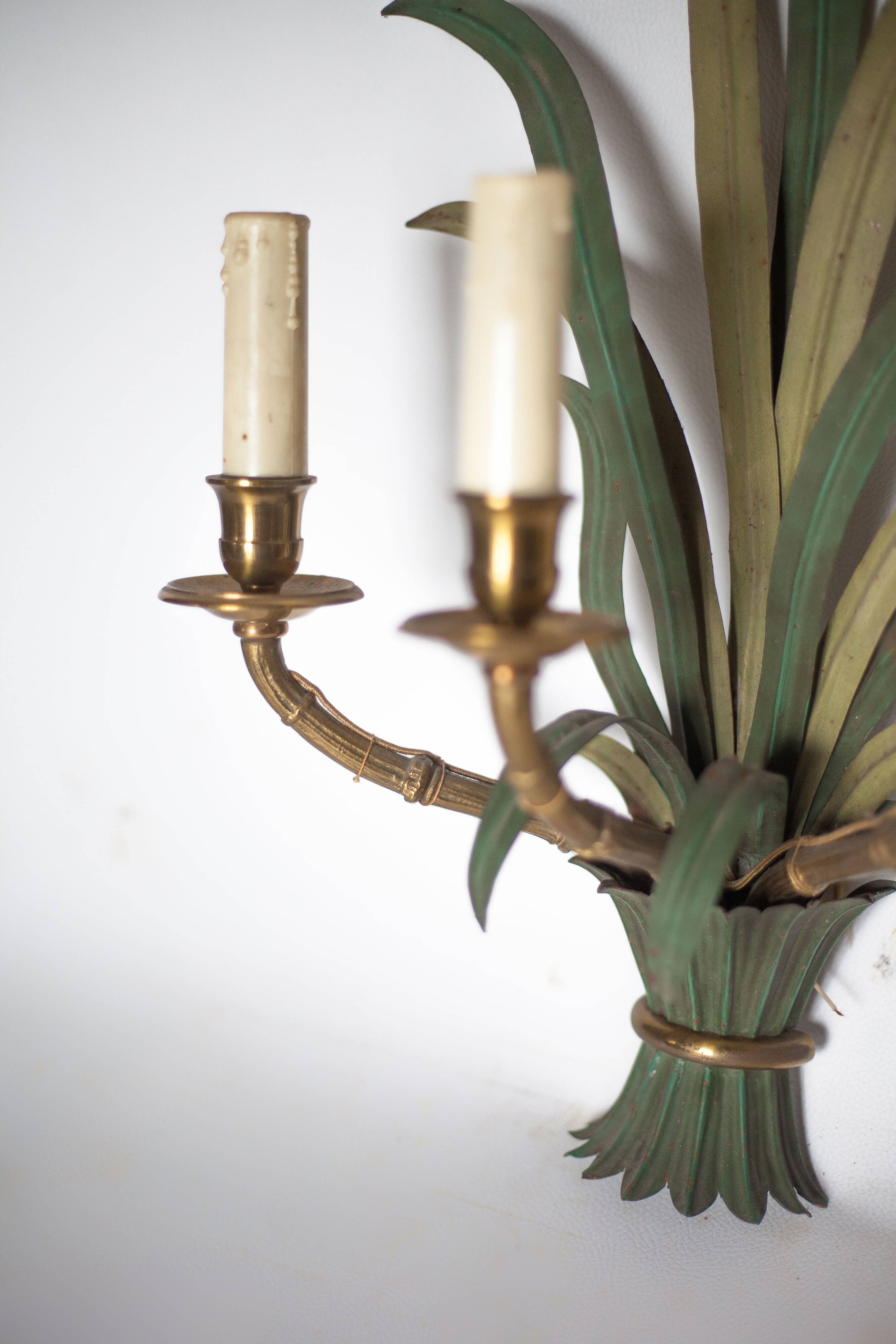 Pair of Maison Baguès wall lights with faux bamboo bronze and metal arms.