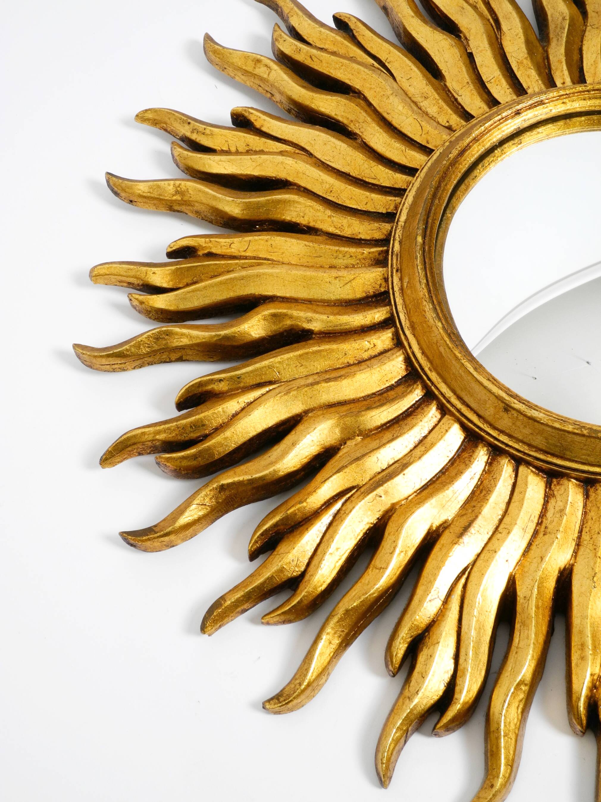 Mid Century Sunburst Kovex wall mirror made of wood and resin - gold plated