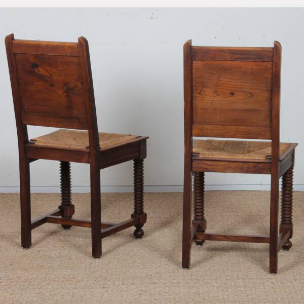 Pair of rush-seated solid wood chairs, French work, 1940.