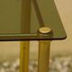 Antique brass serving trolley with smoked glass top, Louis XVI style.