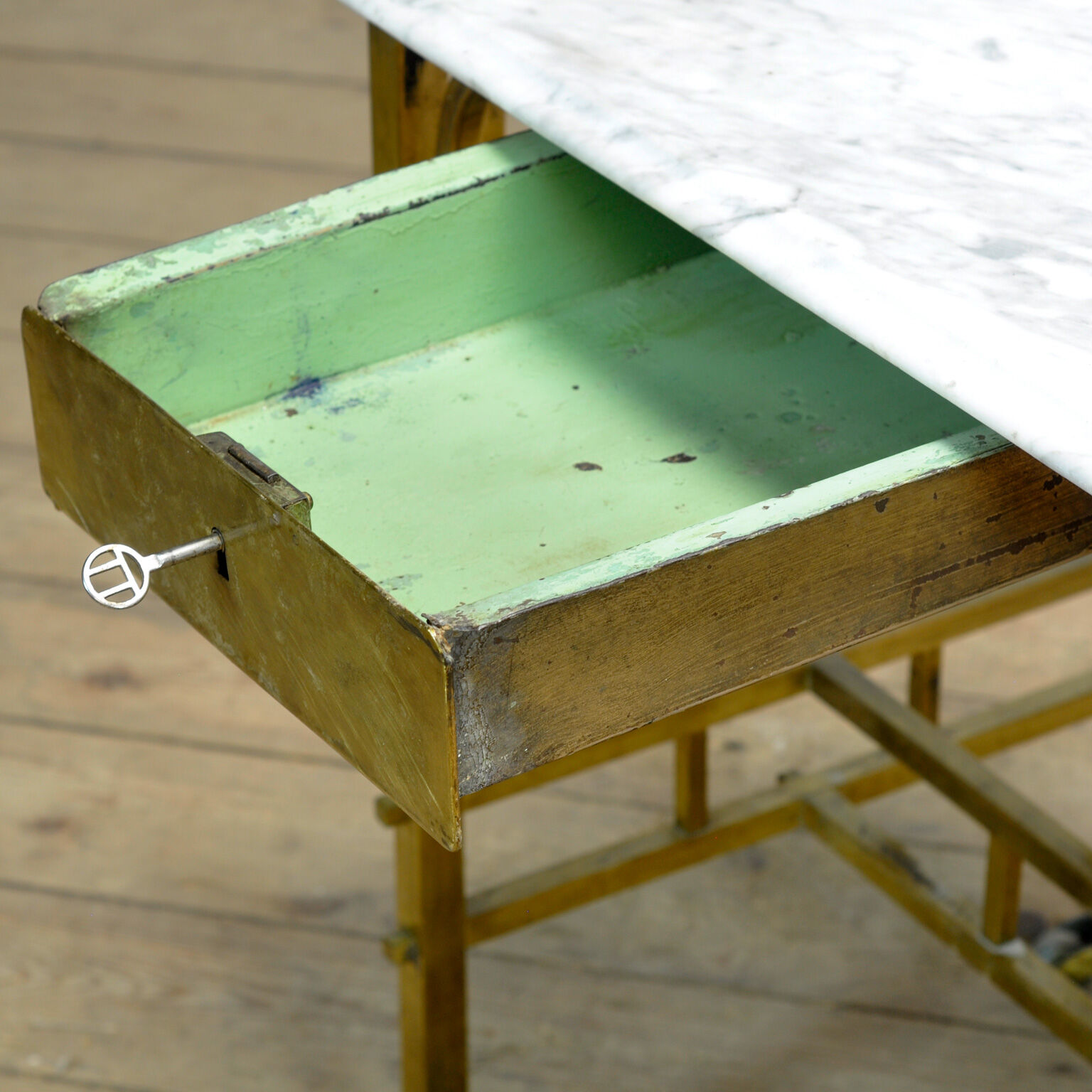 Small brass table with marble top, circa 1910