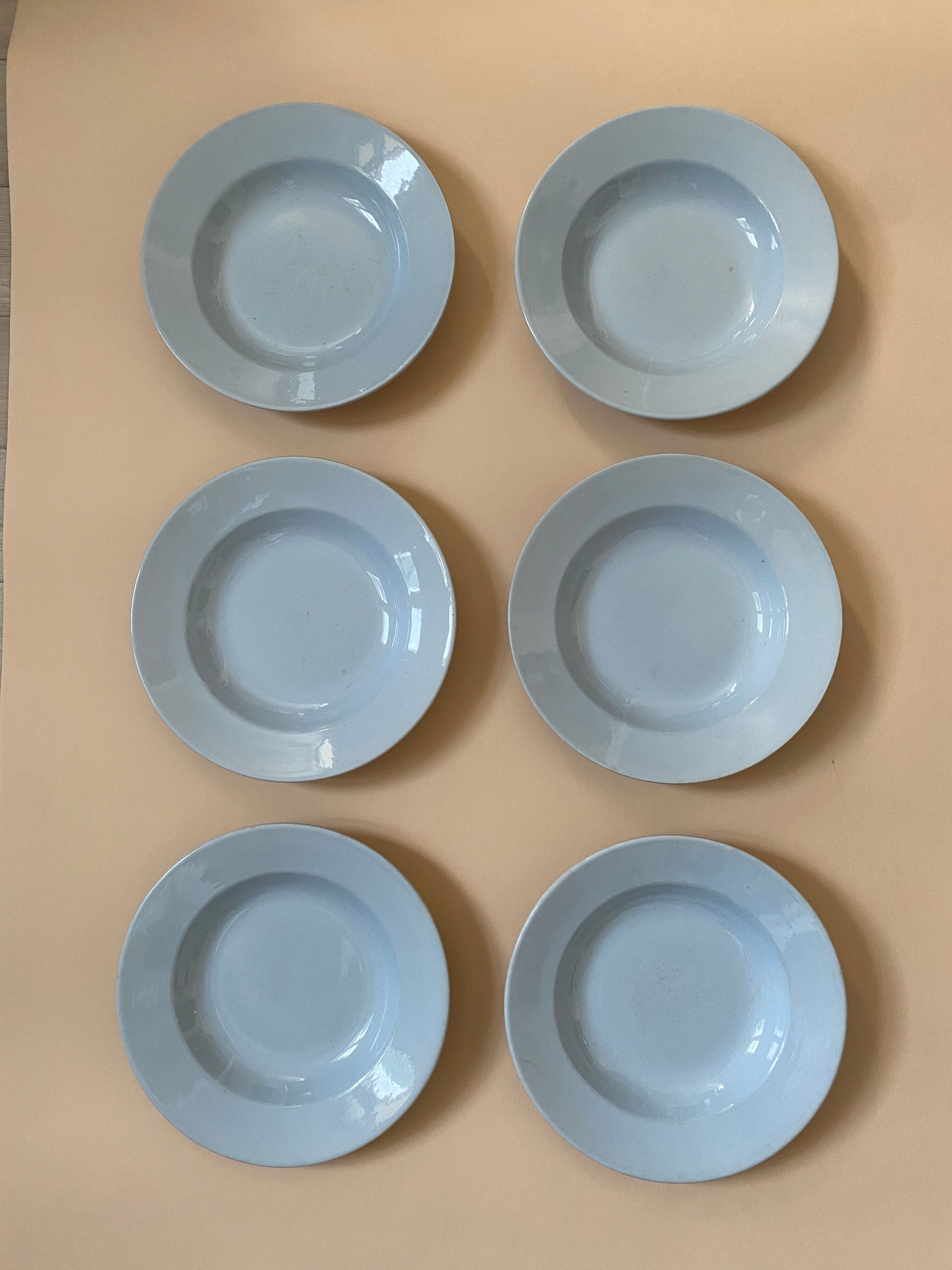 Six blue hollow plates