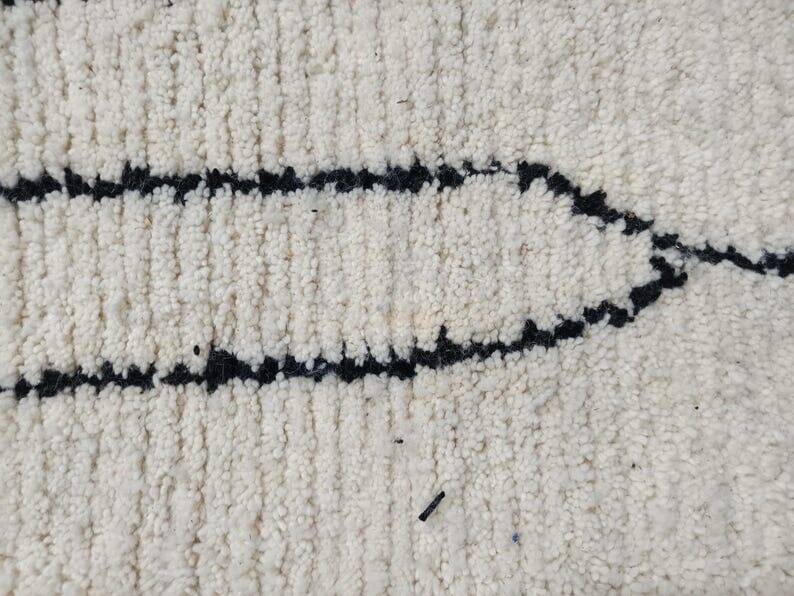 Handmade traditional Moroccan wool rug size 150 x 250 cm.