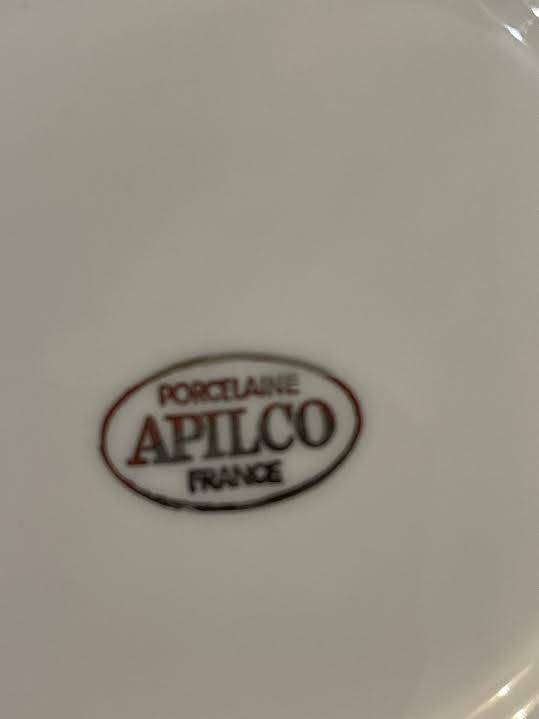 Four porcelain "bistro" cups and saucers