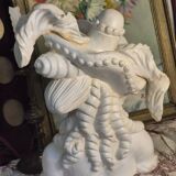 Bust of a woman with a hat