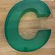 Letter signs C in transparent plexiglass