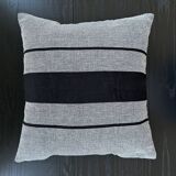 Woven striped cushion