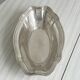 Shallow dish in silver-plated metal
