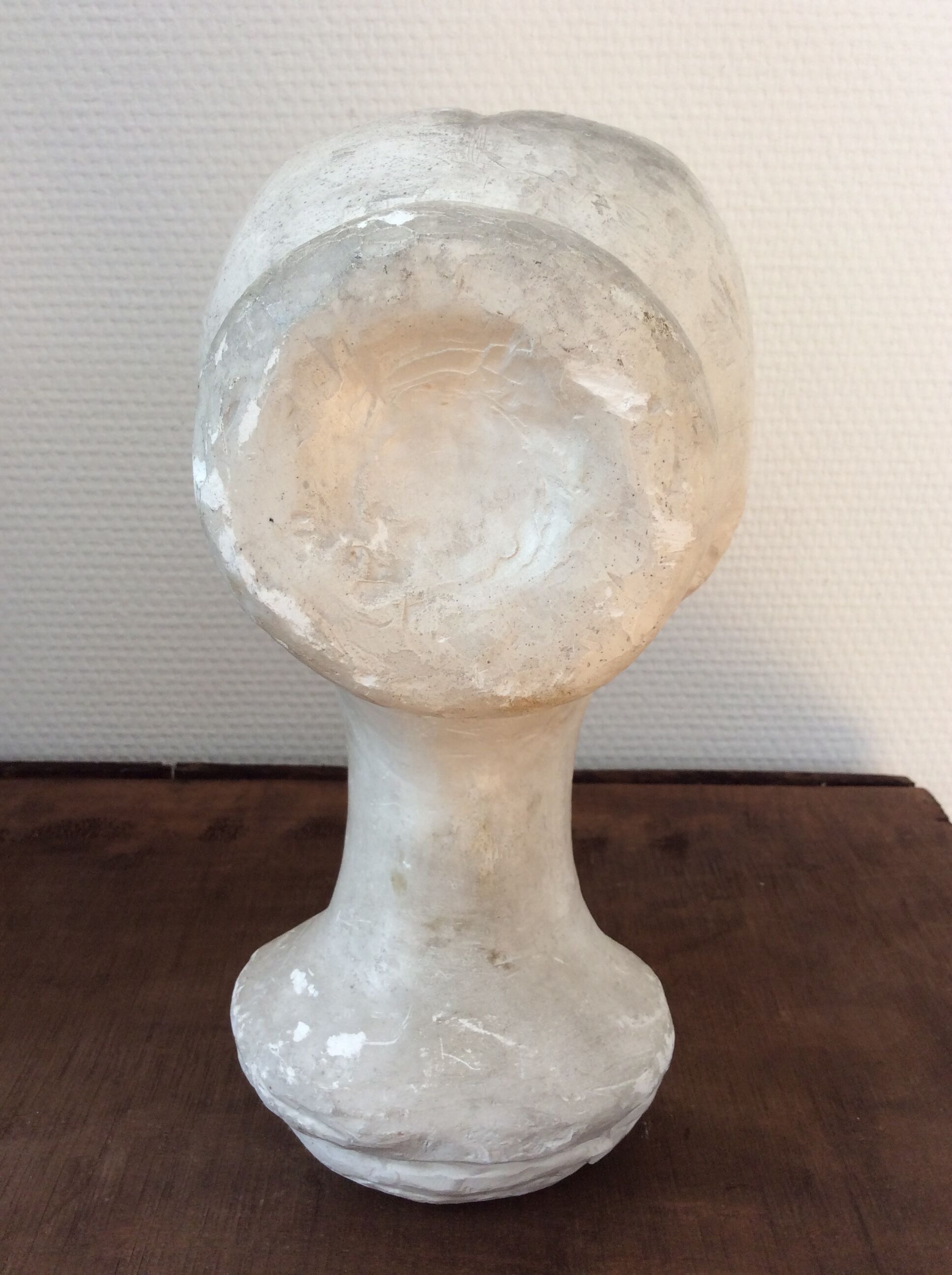 Plaster young woman at the bun