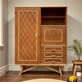Rattan wardrobe with tapered legs from the 1960s.