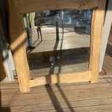 Mirror with irregular wood