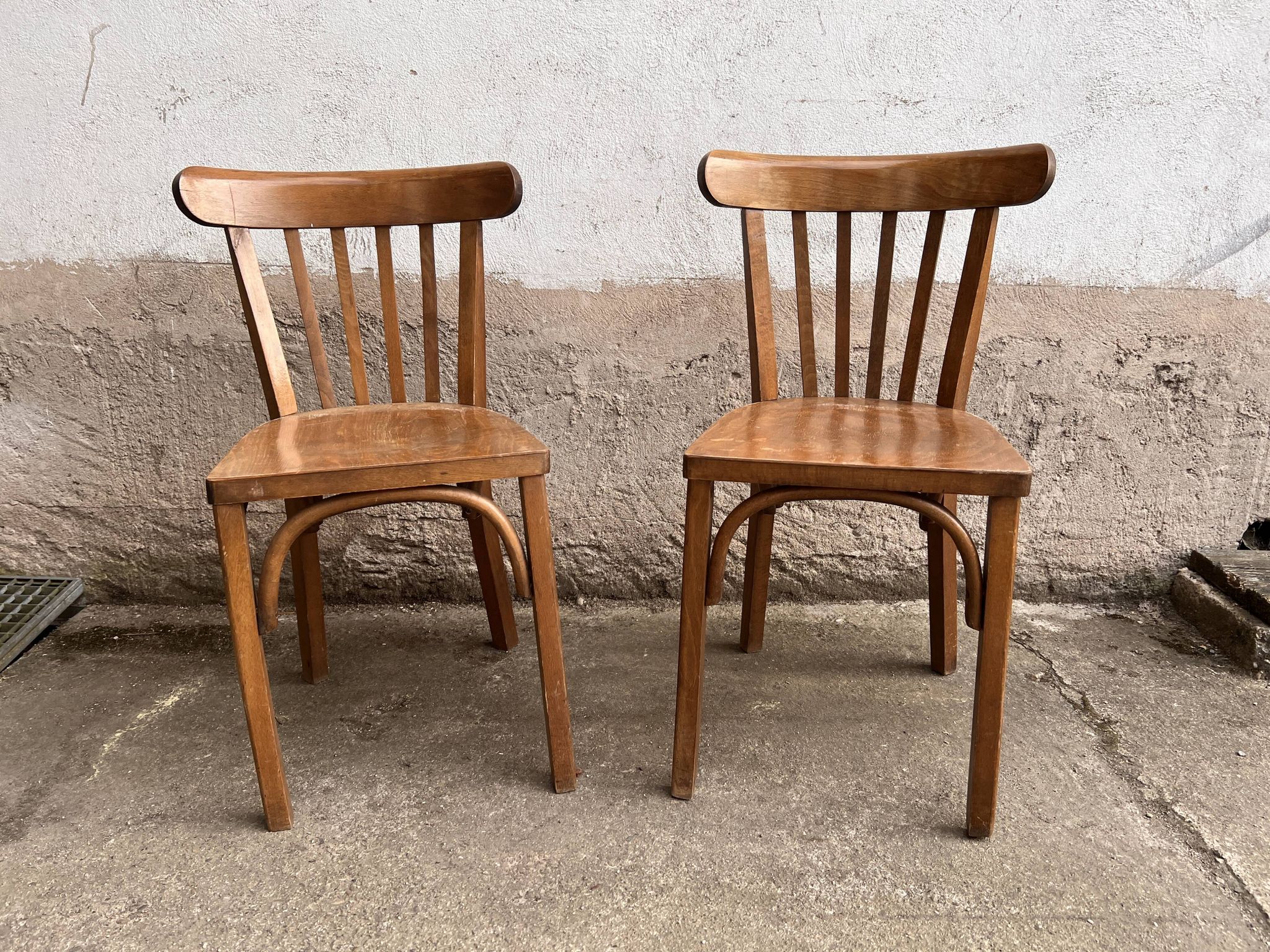 Pair of vintage wooden bistro chairs