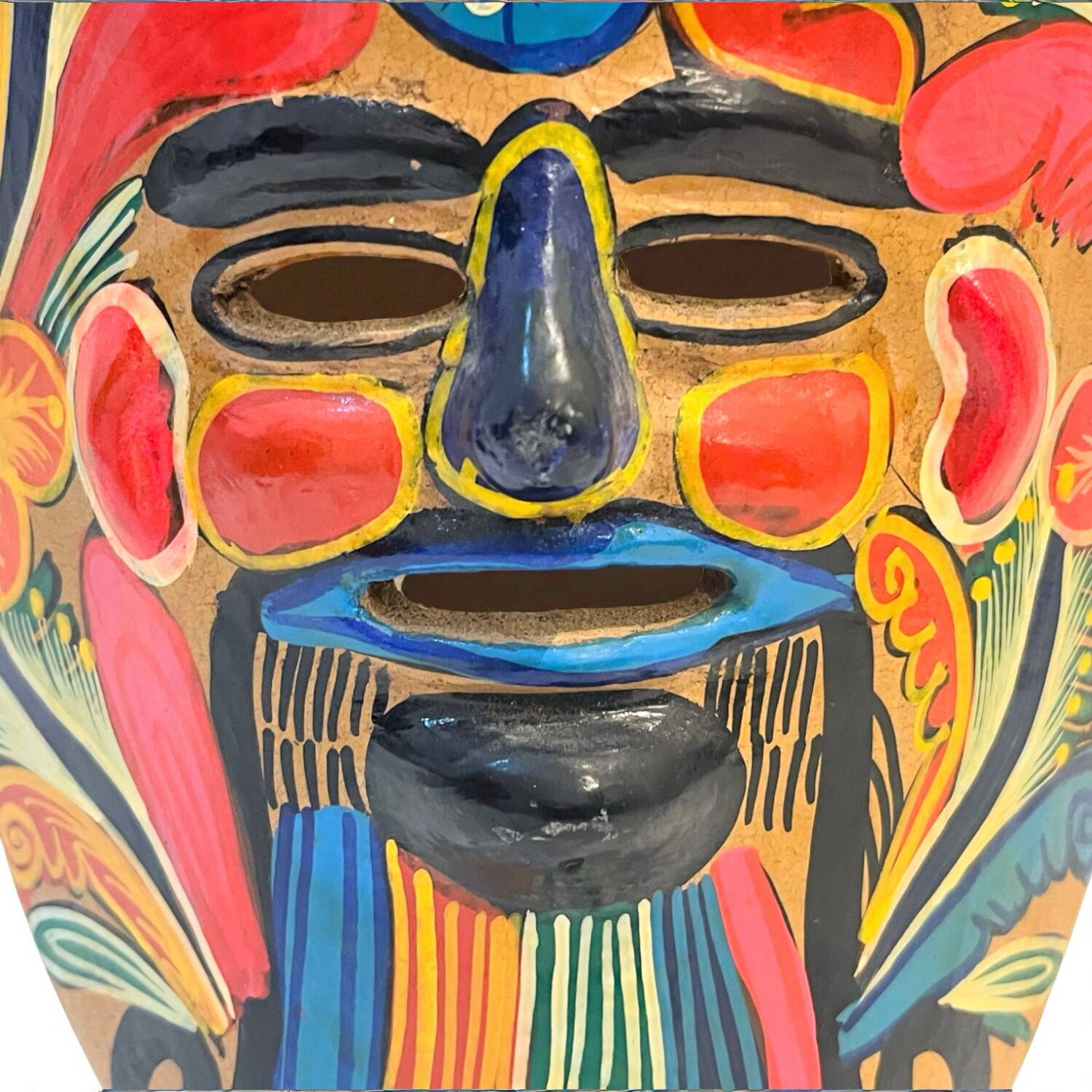 Mexican folk art mask in colored terracotta, 1970s