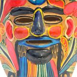Mexican folk art mask in colored terracotta, 1970s