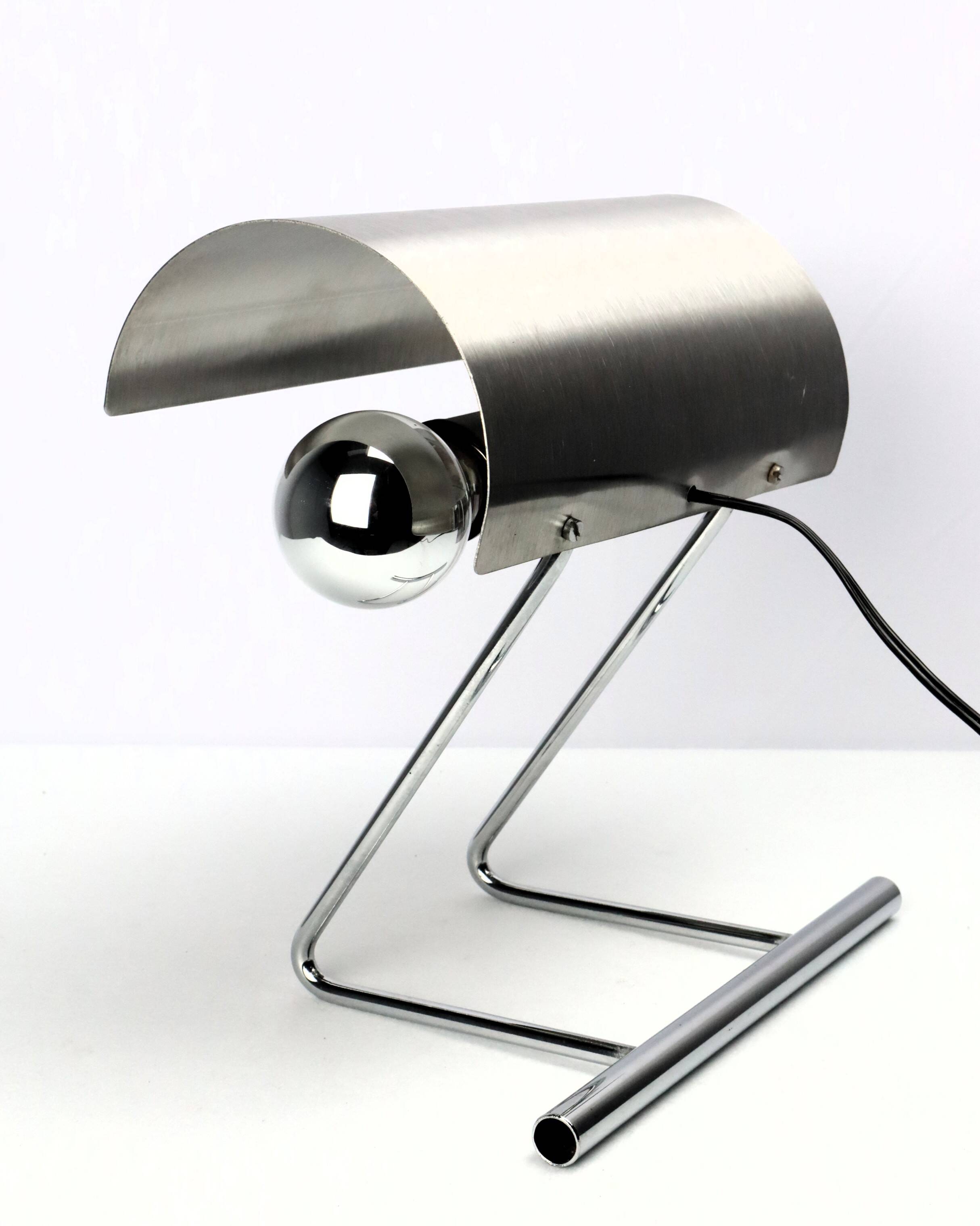 Stainless steel lamp from the 1970s in the style of François Monnet.