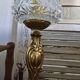 Vintage table lamp with a bronze base and moulded glass globe.