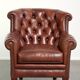 Cognac-coloured cow leather Chesterfield armchair in English style