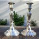 Magnificent pair of silver candlesticks.